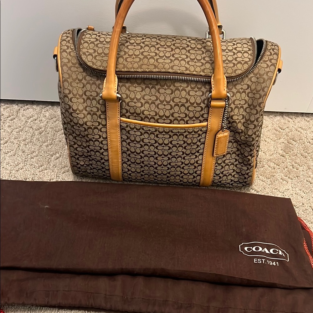 Coach LIMITED EDITION 
Brown and Tan Duffel Bag with Sophisticated Design